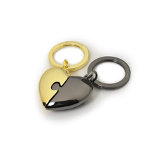 Load image into Gallery viewer, Metalmorphose Two Piece Heart Puzzle Keyring